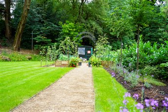 Hatton Garden Landscapes designed and built this outstanding garden in Beaconsfield using a plethora of materials including self binding gravel, sleepers, Millboard, turf, aggregates and compost. This garden looks incredible illuminated at night.   
