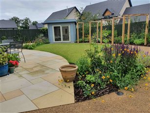 Wildlife garden. This design was about increasing the biodiversity and interest in this new build garden, originally a blank canvas of grass it now has a variety of plants and habitats including a pond. 