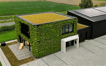 Fully green company building for a positive impact on human and animal habitats