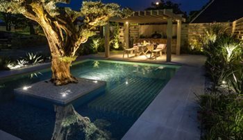 Mediterranean family garden by night.